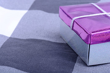 Image showing Single red gift box with white ribbon