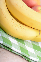 Image showing bananas and apples close up, health food concept