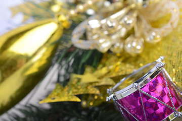 Image showing Christmas wreath with golden ornaments - new year drum, glass ball, Christmas present