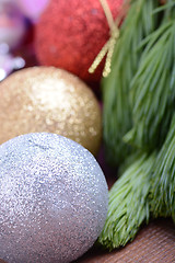 Image showing Christmas tree branch with ball