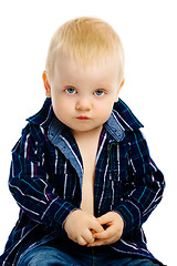 Image showing boy sitting on a white background