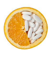 Image showing Orange and pills