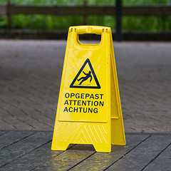 Image showing Watch your step sign on the floor