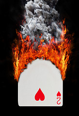 Image showing Playing card with fire and smoke