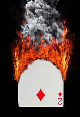 Image showing Playing card with fire and smoke