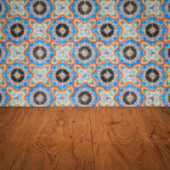 Image showing Wood table top and blur vintage ceramic tile pattern wall