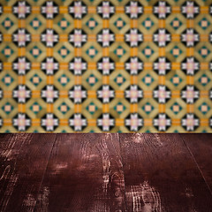 Image showing Wood table top and blur vintage ceramic tile pattern wall