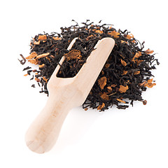 Image showing Black Dry Tea with a Wooden Spoon