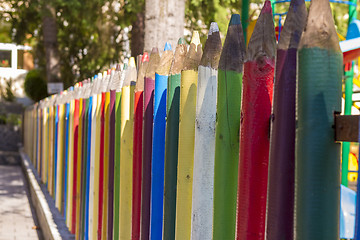 Image showing Fence of colourful pencils