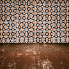 Image showing Wood table top and blur vintage ceramic tile pattern wall