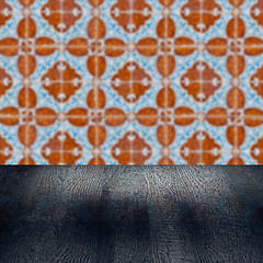 Image showing Wood table top and blur vintage ceramic tile pattern wall