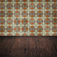 Image showing Wood table top and blur vintage ceramic tile pattern wall