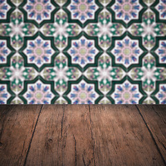 Image showing Wood table top and blur vintage ceramic tile pattern wall