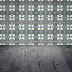 Image showing Wood table top and blur vintage ceramic tile pattern wall