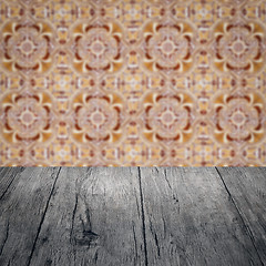 Image showing Wood table top and blur vintage ceramic tile pattern wall