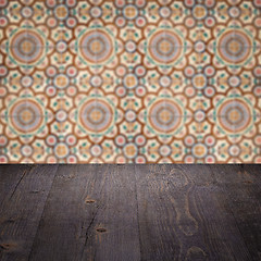 Image showing Wood table top and blur vintage ceramic tile pattern wall