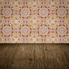 Image showing Wood table top and blur vintage ceramic tile pattern wall