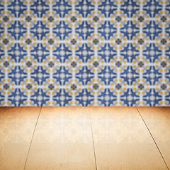 Image showing Wood table top and blur vintage ceramic tile pattern wall