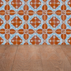 Image showing Wood table top and blur vintage ceramic tile pattern wall