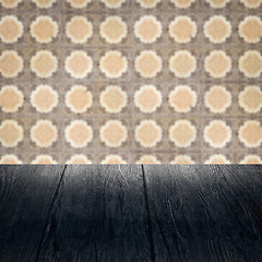 Image showing Wood table top and blur vintage ceramic tile pattern wall