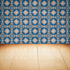 Image showing Wood table top and blur vintage ceramic tile pattern wall