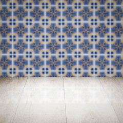 Image showing Wood table top and blur vintage ceramic tile pattern wall