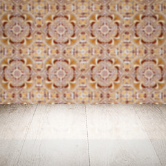 Image showing Wood table top and blur vintage ceramic tile pattern wall