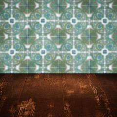 Image showing Wood table top and blur vintage ceramic tile pattern wall