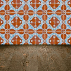 Image showing Wood table top and blur vintage ceramic tile pattern wall