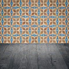 Image showing Wood table top and blur vintage ceramic tile pattern wall