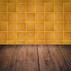 Image showing Wood table top and blur vintage ceramic tile pattern wall