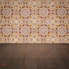 Image showing Wood table top and blur vintage ceramic tile pattern wall