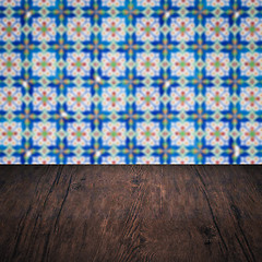 Image showing Wood table top and blur vintage ceramic tile pattern wall