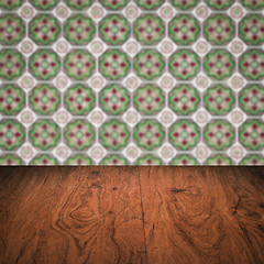 Image showing Wood table top and blur vintage ceramic tile pattern wall