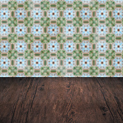 Image showing Wood table top and blur vintage ceramic tile pattern wall