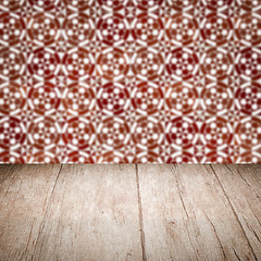 Image showing Wood table top and blur vintage ceramic tile pattern wall