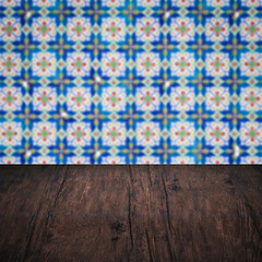 Image showing Wood table top and blur vintage ceramic tile pattern wall