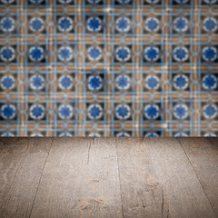 Image showing Wood table top and blur vintage ceramic tile pattern wall