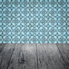 Image showing Wood table top and blur vintage ceramic tile pattern wall