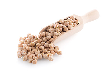 Image showing Uncooked chickpeas and wooden scoop
