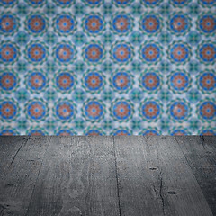 Image showing Wood table top and blur vintage ceramic tile pattern wall