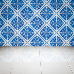 Image showing Wood table top and blur vintage ceramic tile pattern wall