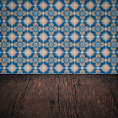 Image showing Wood table top and blur vintage ceramic tile pattern wall