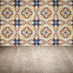 Image showing Wood table top and blur vintage ceramic tile pattern wall