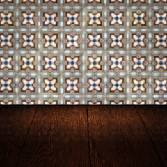 Image showing Wood table top and blur vintage ceramic tile pattern wall