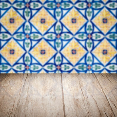 Image showing Wood table top and blur vintage ceramic tile pattern wall