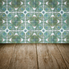 Image showing Wood table top and blur vintage ceramic tile pattern wall