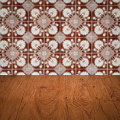 Image showing Wood table top and blur vintage ceramic tile pattern wall