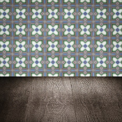 Image showing Wood table top and blur vintage ceramic tile pattern wall