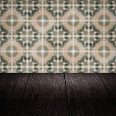 Image showing Wood table top and blur vintage ceramic tile pattern wall